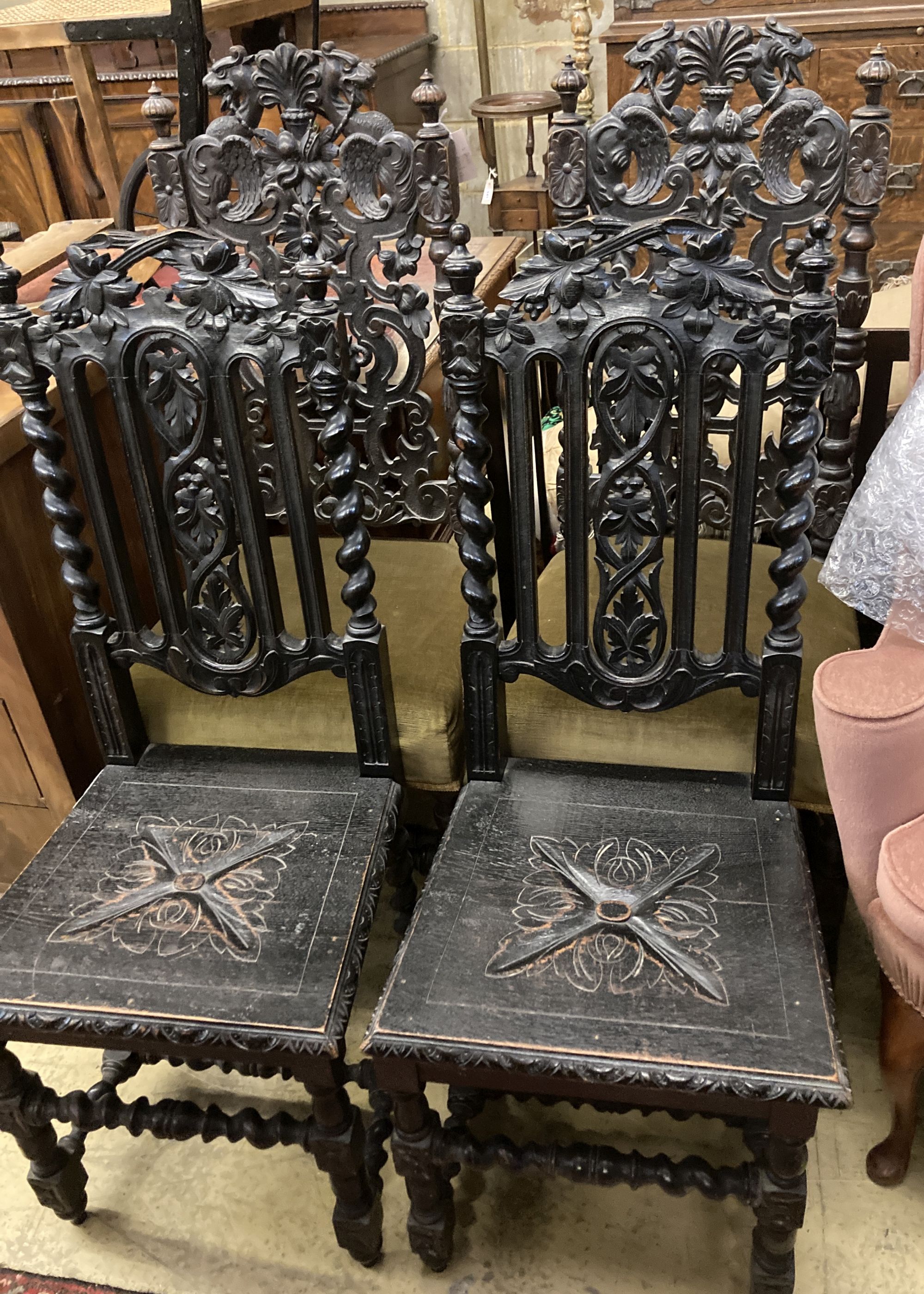 Two pairs of Victorian carved oak dining chairs